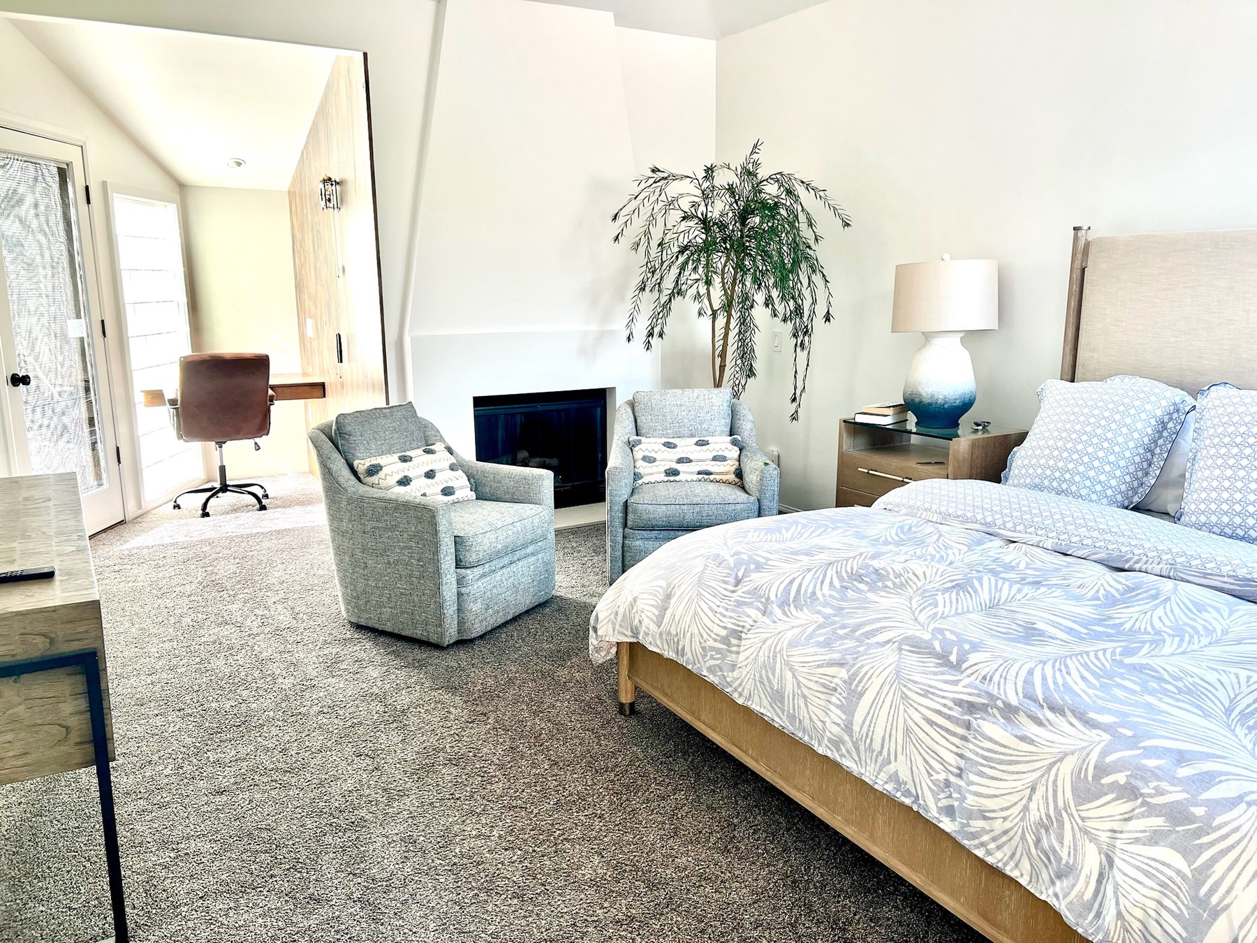 Second bedroom — king bed, garden views