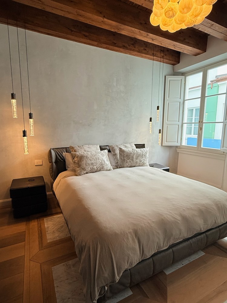 Fourth bedroom — original stone detail