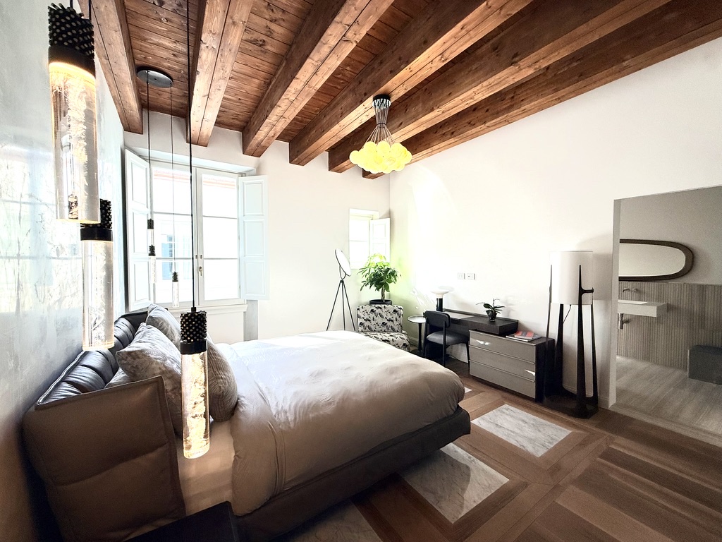 Primary bedroom with its en-suite bath
