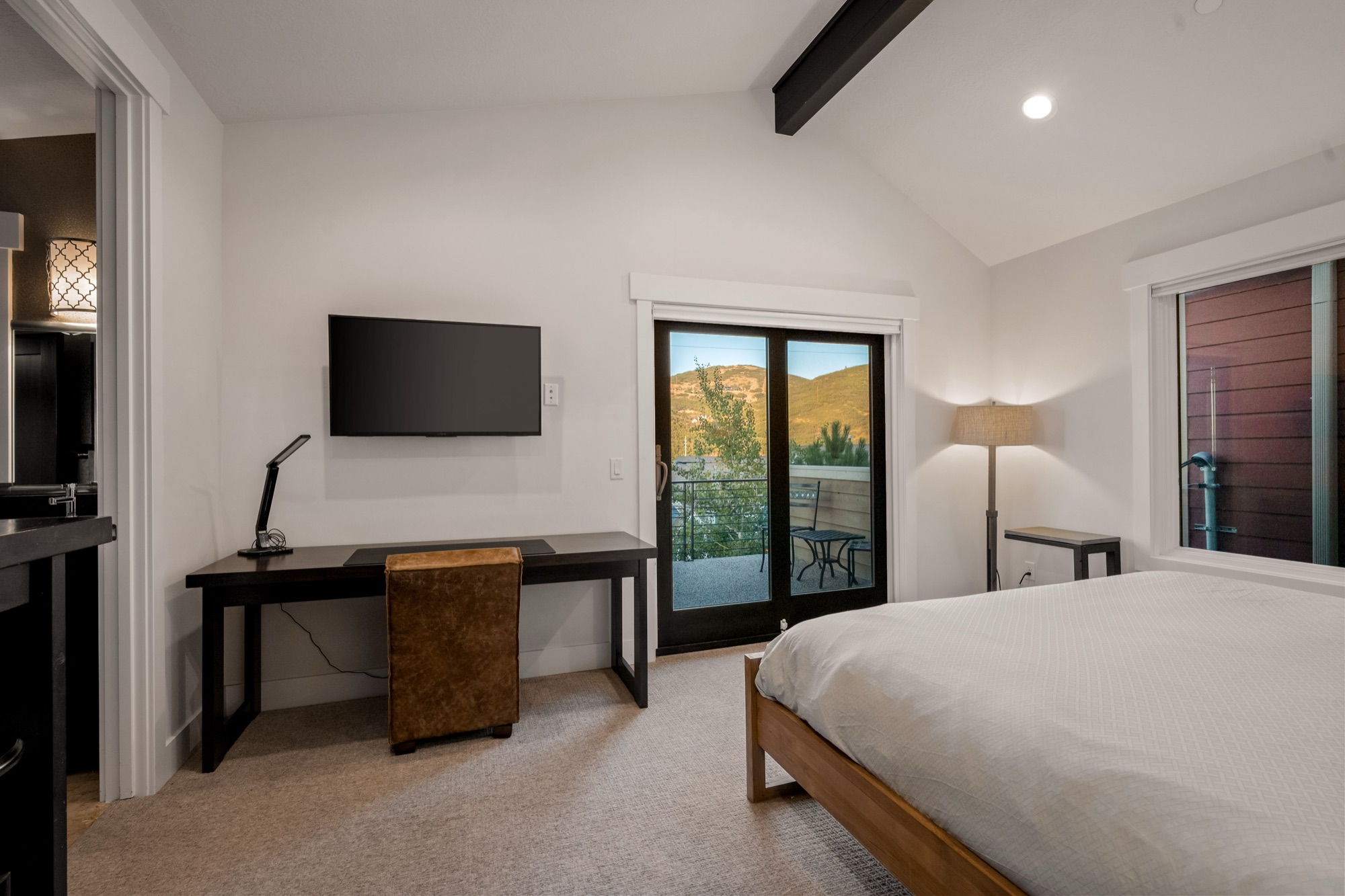 Guest bedroom — king bed, sliding door to back patio