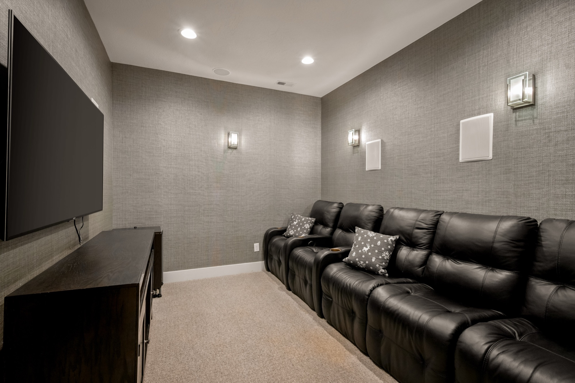 Movie room with leather recliners