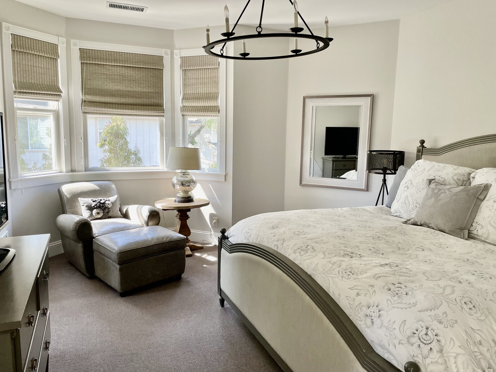Master Bedroom — king bed, bay window, candelabra chandelier